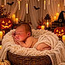 Christian is registered to the contest to win money with this photo: newborn, baby, sleeping, infant, portrait, halloween, pumpkin, jack_o_lantern, candle, basket, blanket, cozy, autumn, witch_hat, bat, lantern, firelight, indoor, seasonal_decor, peaceful