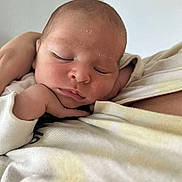 Noa participe au concours pour gagner de l'argent avec cette photo : newborn, baby, sleeping, infant, hand, face, skin, person, closeup, rest, peaceful, soft, blanket, comfort, portrait, indoor, young, head, cuddle, toddler