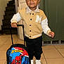 toddler, child, boy, indoor, jacket, backpack, spiderman, white_shoes, tile_floor, stairs, door, smiling, standing, person, young_child, casual_clothing, portrait, handbag, small_boy, cute