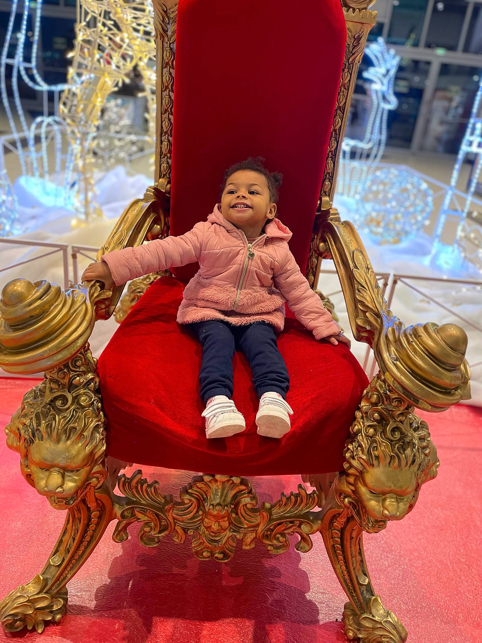 Mya participe au concours pour gagner de l'argent avec cette photo : beauty, carpet, chair, classic, comfort, event, flooring, furniture, human_body, interior_design, joy, lap, leisure, magenta, person, red, room, sitting, temple, textile