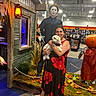 costume, decoration, dog, halloween, horror, indoor, mannequin, mask, michael_myers, person, pet, portrait, pumpkin, retail, rope, scarecrow, small_dog, smiling, store, woman
