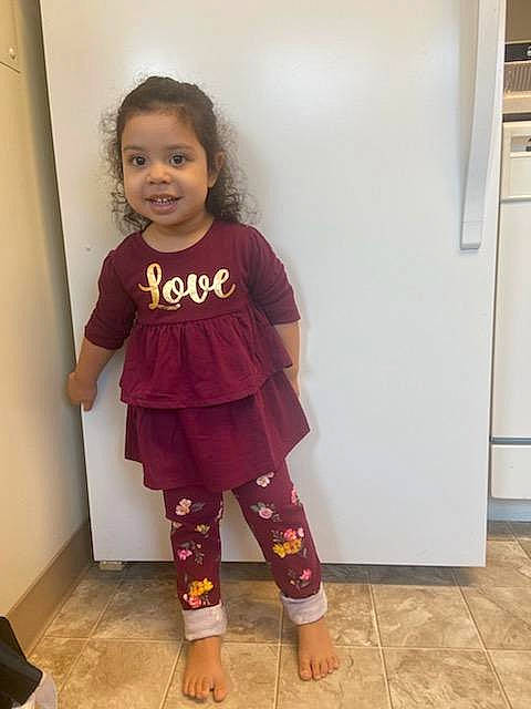 Amethyst is registered to the contest to win money with this photo: baby_toddler_clothing, child, fashion_design, flooring, fun, happy, joint, joy, knee, long_hair, magenta, neck, pattern, person, shoulder, sleeve, smile, standing, t_shirt, thigh