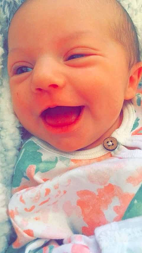 Annabelle is registered to the contest to win money with this photo: cheek, child, chin, close_up, eye, eyebrow, face, facial_expression, forehead, girl, head, human_hair_color, infant, lip, mouth, nose, person, pink, skin, smile