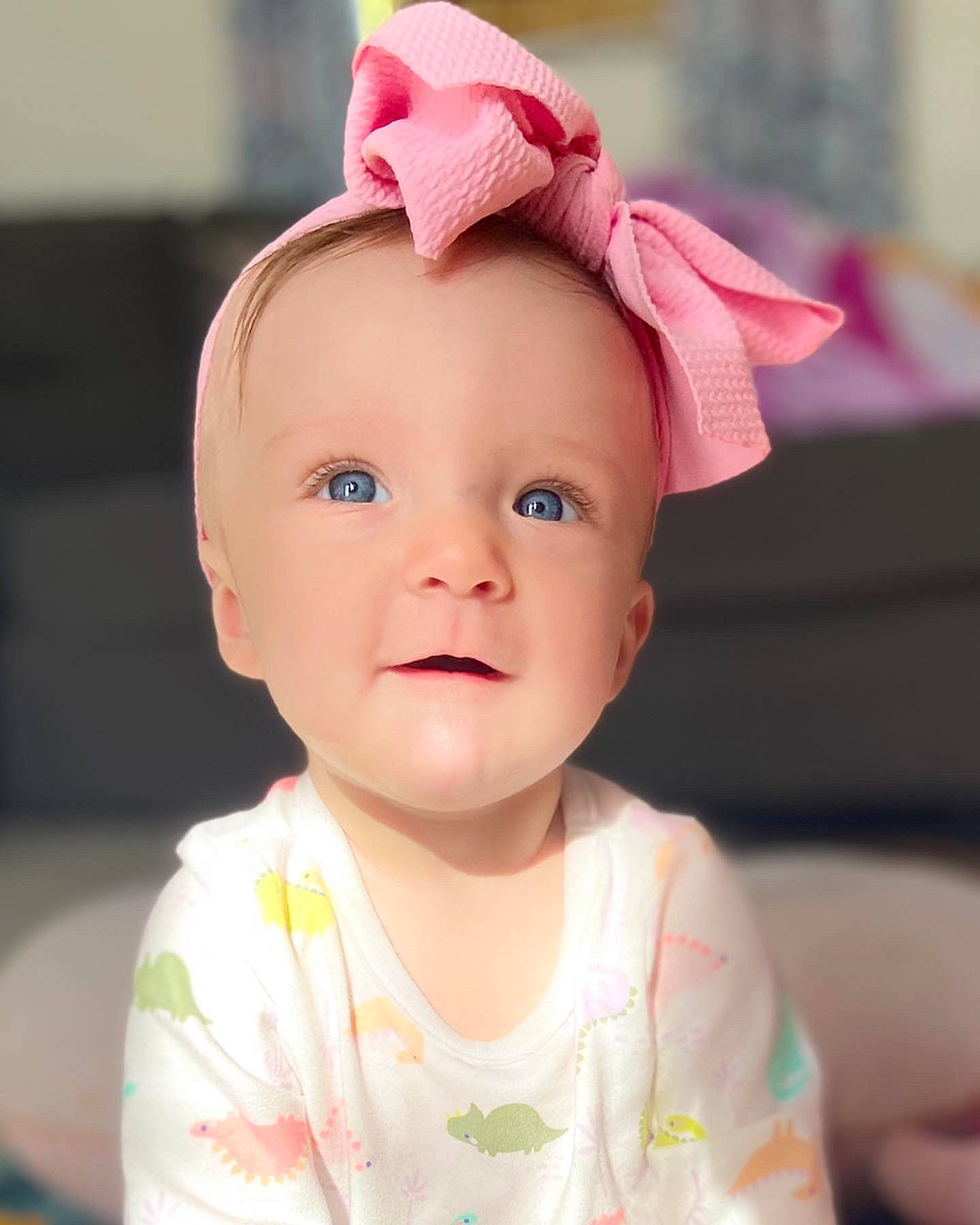 Juliet joined the competition — help win amazing prizes! baby, baby_toddler_clothing, cap, cheek, costume_hat, ear, eye, eyebrow, eyelash, face, happy, headpiece, iris, lip, neck, nose, person, pink, skin, sleeve