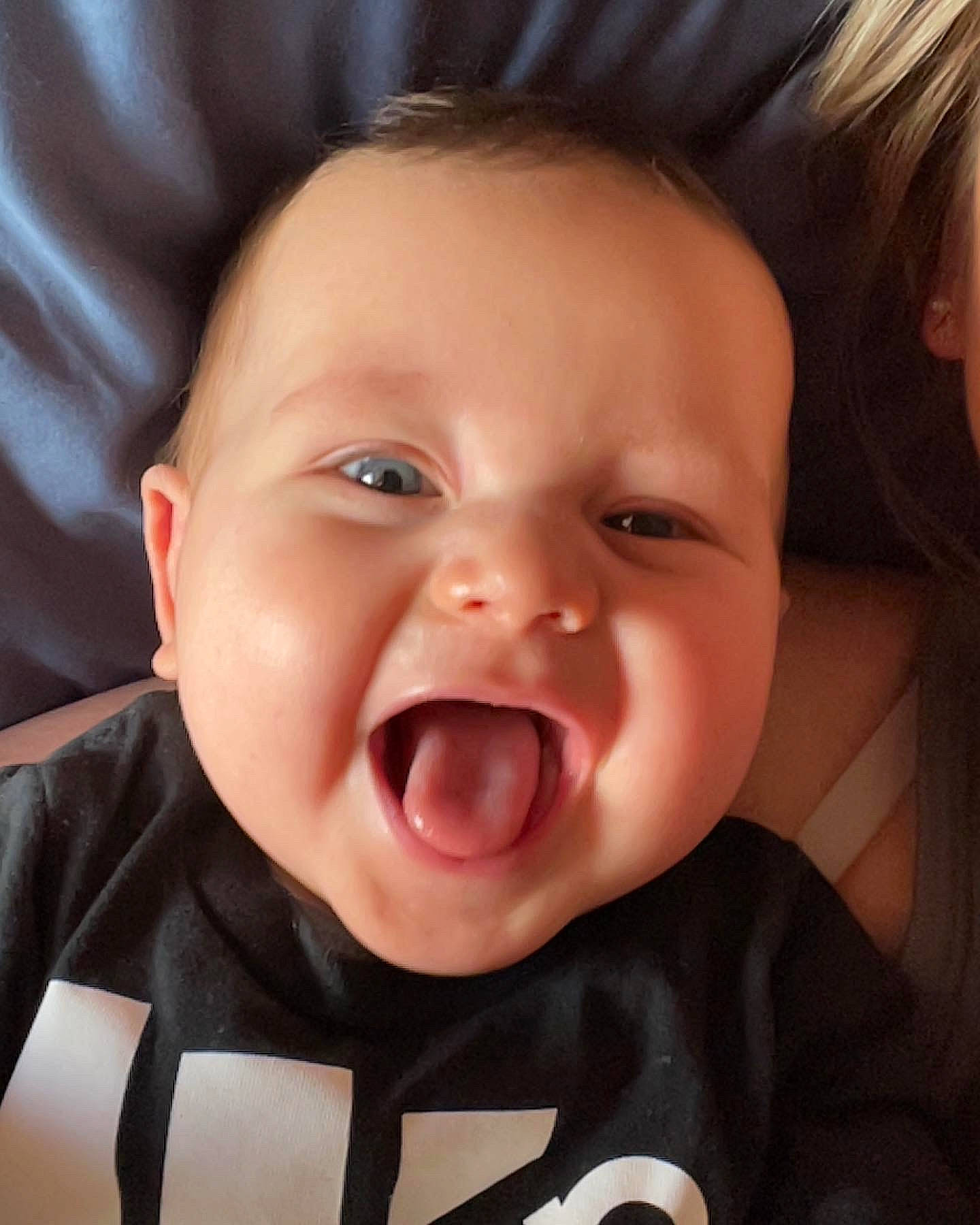 Paxton joined the competition — help win amazing prizes! baby, black, cheek, chin, ear, eyebrow, facial_expression, forehead, happy, head, iris, lip, mouth, nose, organ, person, skin, sleeve, smile, tongue