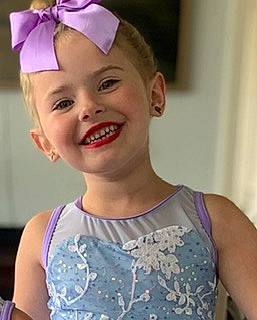 Giavonna is registered to the contest to win money with this photo: active_tank, blond, child, clothing, costume_hat, electric_blue, event, fashion_accessory, fun, hairstyle, happy, headband, headgear, headpiece, headwear, joy, magenta, party_supply, person, pink