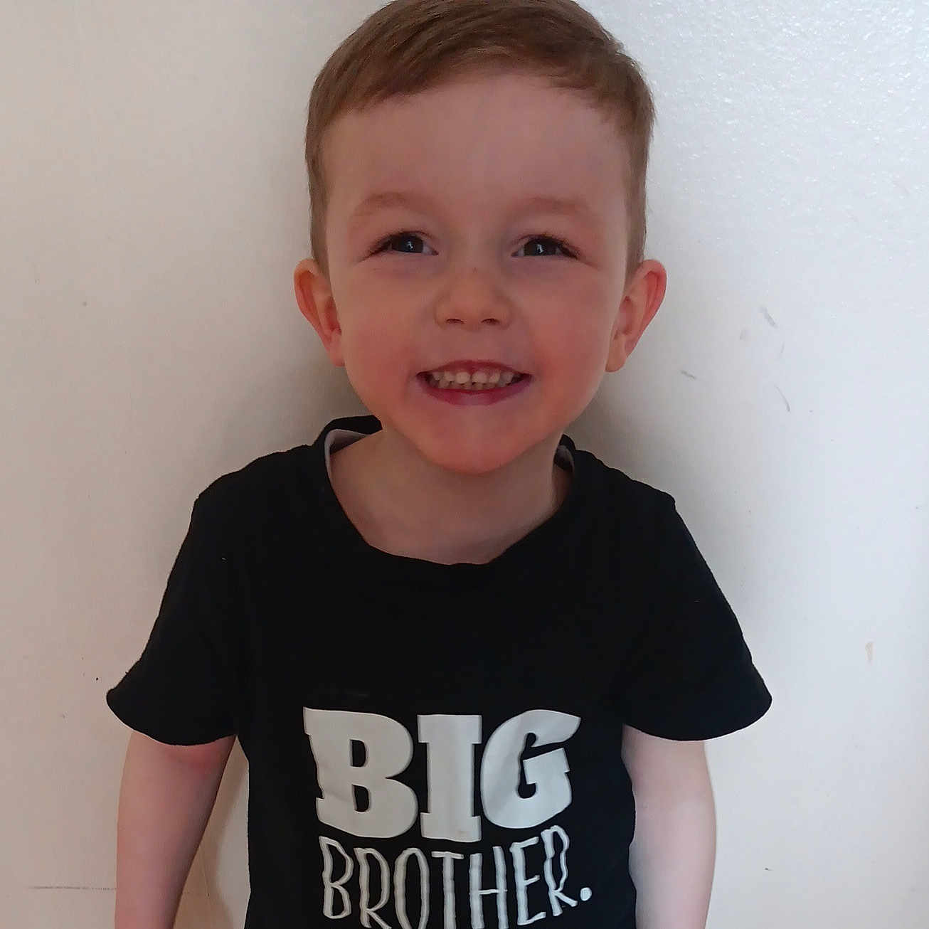 Daniel joined the competition — help win amazing prizes! animal, bodypart, boy, child, clothing, face, happy, head, invertebrate, male, mouth, person, photography, portrait, shirt, sleeve, smile, spider, t_shirt, teeth