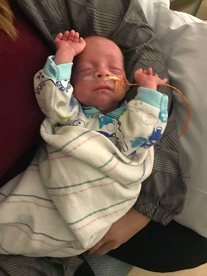 Ashton Cole is registered to the contest to win money with this photo: arm, baby, birth, cheek, child, comfort, nap, person, sitting, skin, sleep, toddler