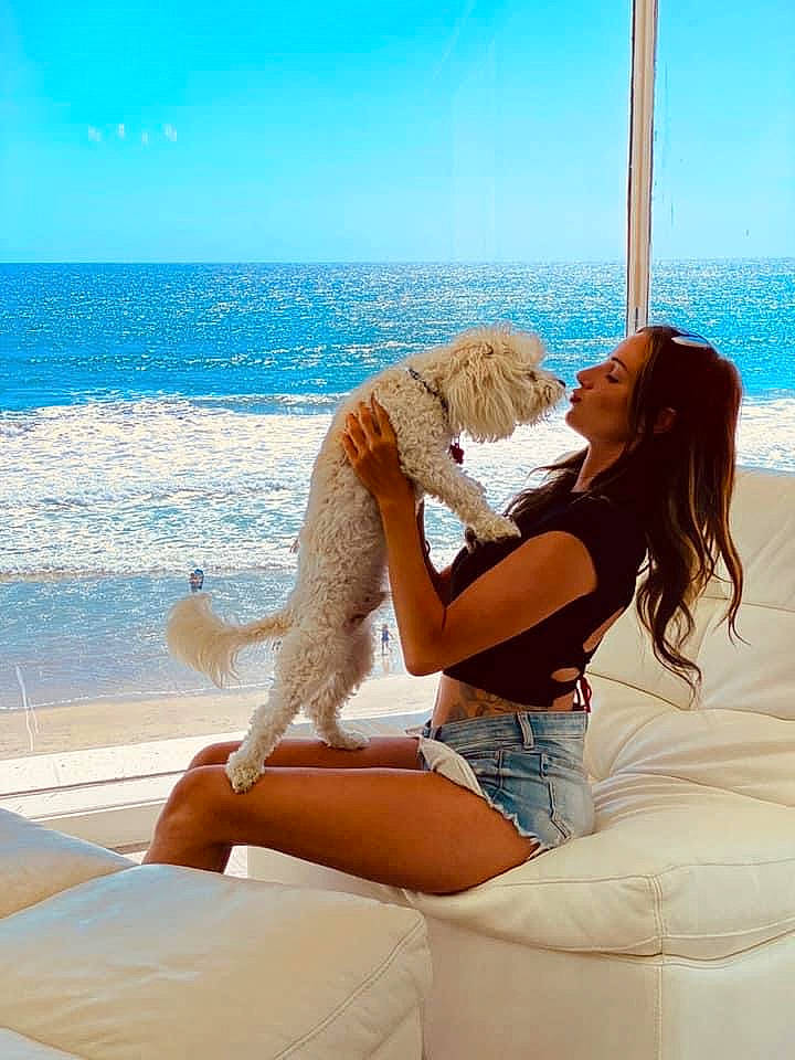 Charlie joined the competition — help win amazing prizes! azure, blue, comfort, elbow, fun, hand, happy, human_body, human_leg, joint, knee, leg, leisure, long_hair, shoulder, sky, sunlight, thigh, travel, water