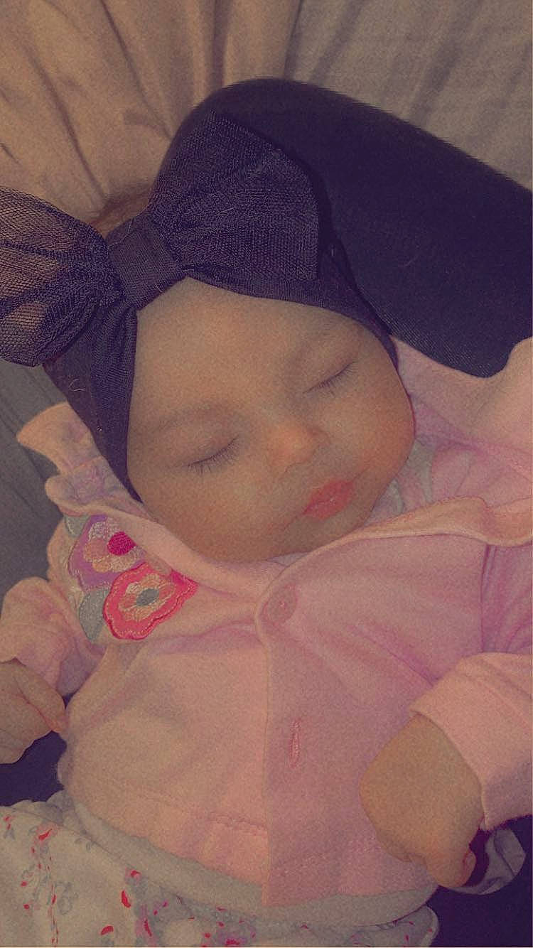 Amanda joined the competition — help win amazing prizes! baby, baby_toddler_clothing, beauty, bonnet, cap, cheek, child, comfort, eyelash, fashion_accessory, knit_cap, linens, lip, magenta, peach, person, pink, skin, sleeve, textile