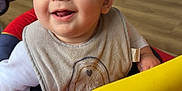 Bryson is registered to the contest to win money with this photo: baby, smiling, indoor, baby_walker, child, face, clothing, floor, toy, furniture, happy, person, young_child, seat, playtime, cute, infant, expression, head, room