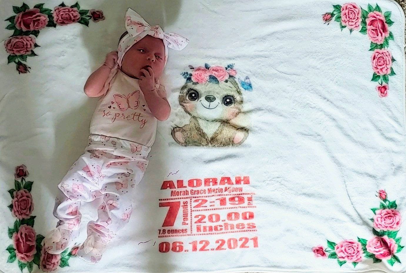 Alorah is registered to the contest to win money with this photo: art, baby_toddler_clothing, christmas, craft, creative_arts, event, fawn, fictional_character, font, happy, linens, magenta, needlework, pattern, peach, person, petal, pink, sleeve, stuffed_toy