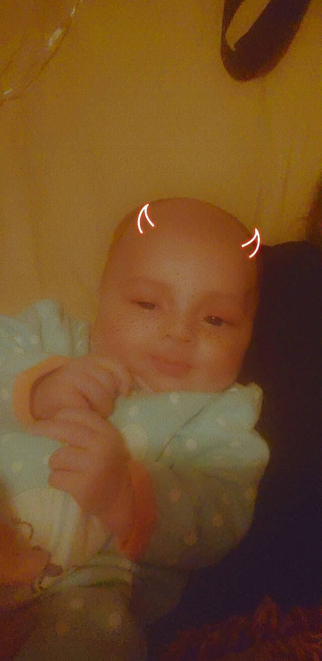 Alorah is registered to the contest to win money with this photo: art, baby, baby_products, baby_toddler_clothing, cheek, child, comfort, ear, fun, gesture, happy, linens, lip, nail, nose, person, room, smile, thumb, toddler