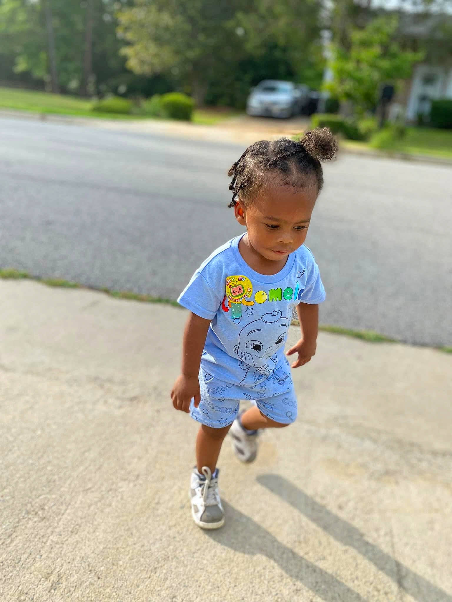 Jacob Scales Jr. is registered to the contest to win money with this photo: asphalt, baby, baby_toddler_clothing, child, denim, electric_blue, fun, grass, hairstyle, happy, leisure, pattern, person, plant, recreation, road, shorts, sleeve, t_shirt, toddler