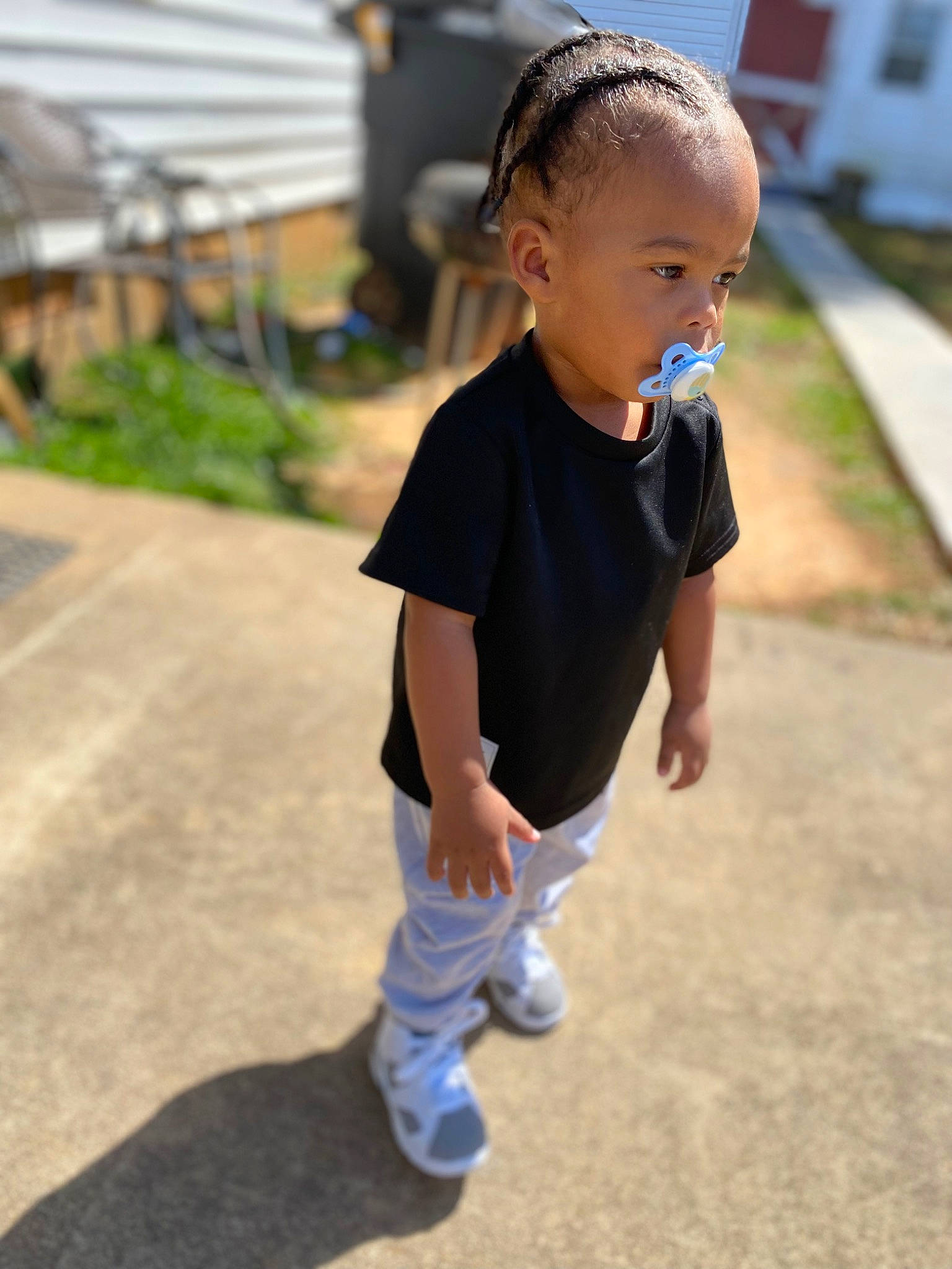 Jacob Scales Jr. is registered to the contest to win money with this photo: asphalt, baby, baby_toddler_clothing, child, electric_blue, eye, face, fun, grass, hair, happy, head, leisure, person, plant, recreation, road, sleeve, t_shirt, toddler