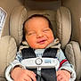 baby, car_seat, child, closed_eyes, clothing, comfort, cute, hand, happy, indoors, infant, infant_car_seat, newborn, peaceful, relaxation, safety, safety_harness, seat, seatbelt, smile