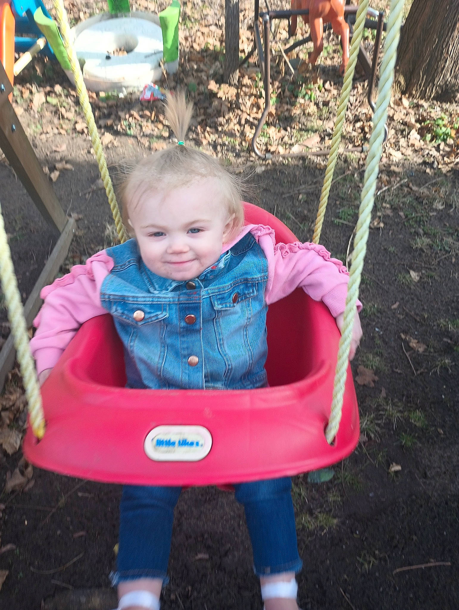 Everly joined the competition — help win amazing prizes! baby, baby_products, baby_toddler_clothing, chair, child, electric_blue, facial_expression, fun, grass, green, happy, joy, leisure, magenta, outdoor_furniture, person, play, recreation, sitting, smile