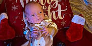 Liam Hughes joined the competition — help win amazing prizes! baby, infant, pajamas, bear_design, christmas, holiday, decorations, stockings, ornaments, cushion, red, festive, tree, celebration, cute, indoors, relaxing, holiday_spirit, child, sleepwear
