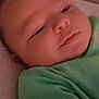 Blake joined the competition — help win amazing prizes! baby, infant, child, green_clothing, sleepy, face, closeup, soft_lighting, portrait, lying_down, skin, head, ear, nose, mouth, eyes, baby_clothes, young_child, peaceful, indoors