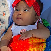 Adelina joined the competition — help win amazing prizes! baby, headband, red_bow, blanket, knitted, colorful, infant, child, cute, portrait, hand, clothing, sleeping_area, soft_light, indoors, face, young_child, peaceful, curious, resting