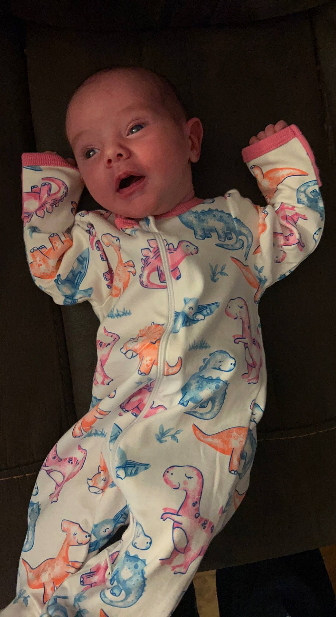 Shelby is registered to the contest to win money with this photo: arm, baby_toddler_clothing, cheek, comfort, eye, face, finger, gesture, head, human_body, iris, lip, mouth, neck, nose, organ, person, pink, skin, sleeve