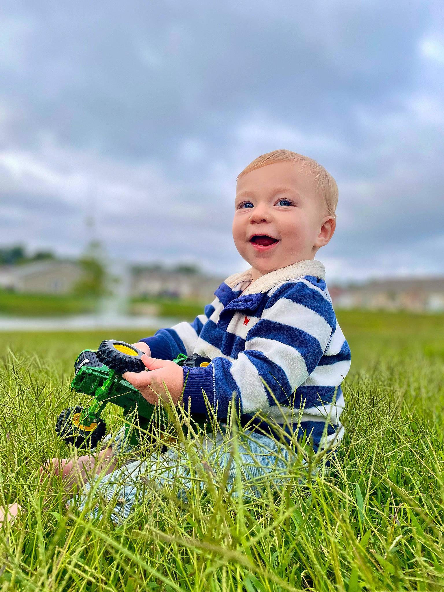 Crue joined the competition — help win amazing prizes! baby, baby_toddler_clothing, cloud, electric_blue, flash_photography, fun, grass, grassland, happy, landscape, leisure, meadow, people_in_nature, person, plant, prairie, sitting, sky, smile, toddler