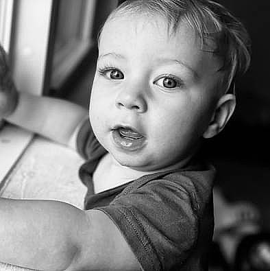 Crue is registered to the contest to win money with this photo: baby, beauty, black_and_white, cheek, child, ear, eyelash, facial_expression, flash_photography, gesture, happy, human, human_body, lip, monochrome, monochrome_photography, nose, person, smile, style