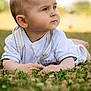 baby, child, grass, outdoor, nature, curious, portrait, crawling, infant, white_clothing, closeup, young, person, summer, daylight, cute, face, skin, hands, expression