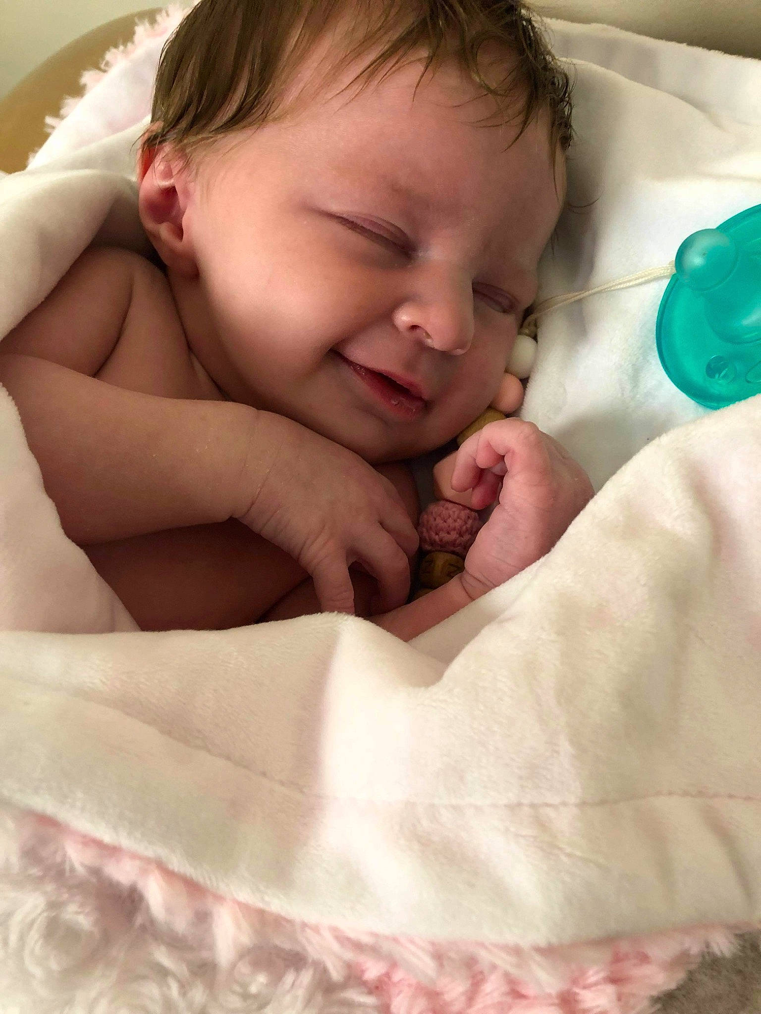 Joycelynn is registered to the contest to win money with this photo: baby, cheek, child, comfort, face, facial_expression, finger, gesture, hair, hand, happy, head, mouth, nose, person, pink, skin, smile, textile, thumb