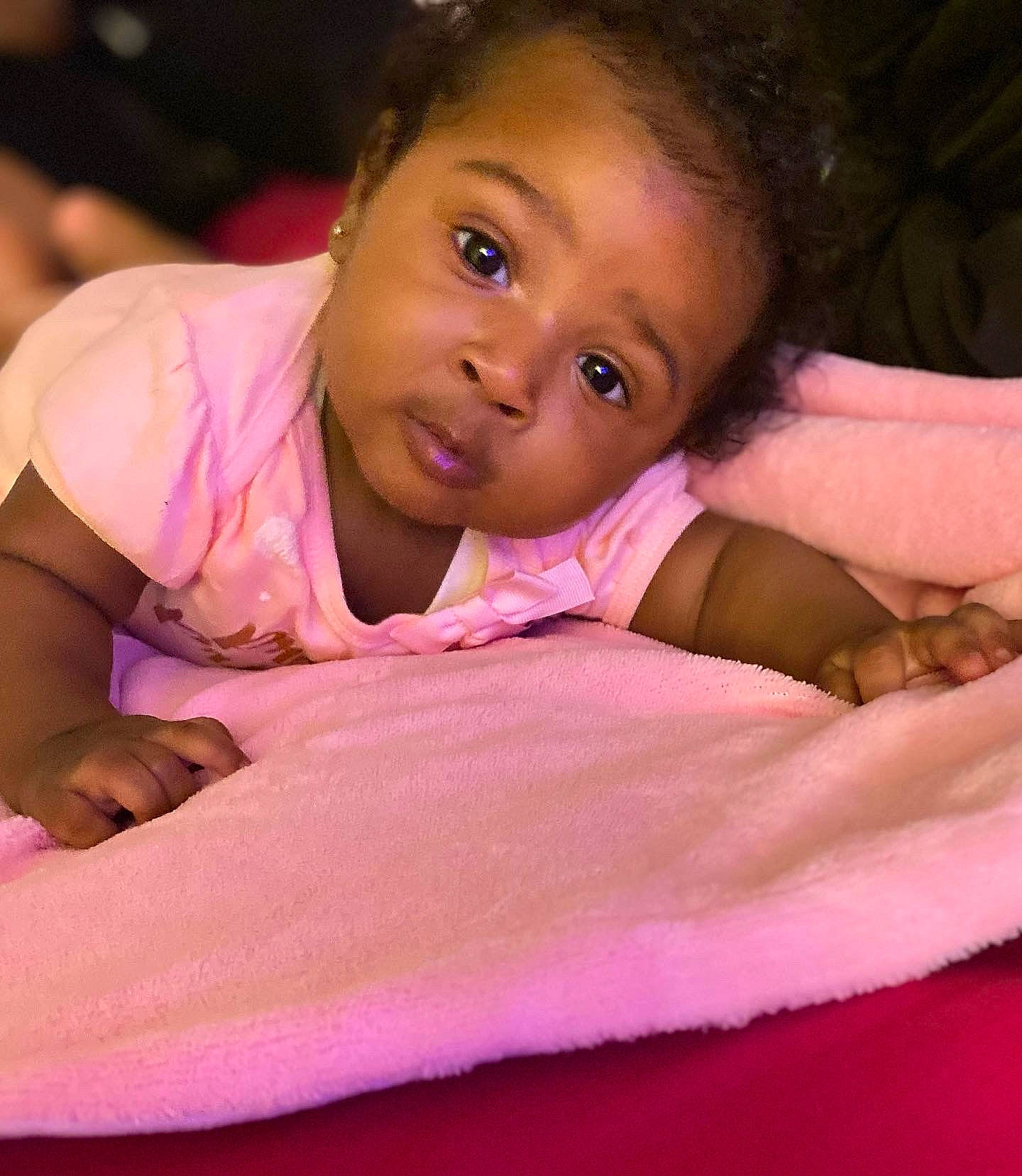 Asiyah is registered to the contest to win money with this photo: baby_toddler_clothing, cheek, child, chin, comfort, event, eyelash, finger, flash_photography, fun, hair, happy, lip, magenta, mouth, nose, person, pink, skin, thumb