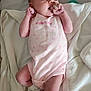 Aiyana is registered to the contest to win money with this photo: baby, blanket, child, cute, face, hand, hello_kitty, indoors, infant, lying_down, newborn, onesie, pacifier, person, pink, sleepwear, small, socks, soft_texture, white