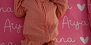 Aiyana joined the competition — help win amazing prizes! newborn, baby, pacifier, headband, flower, blanket, pink, peach, clothing, lying_down, infant, cute, soft, sleepwear, cozy, indoors, heart_pattern, textile, child, small