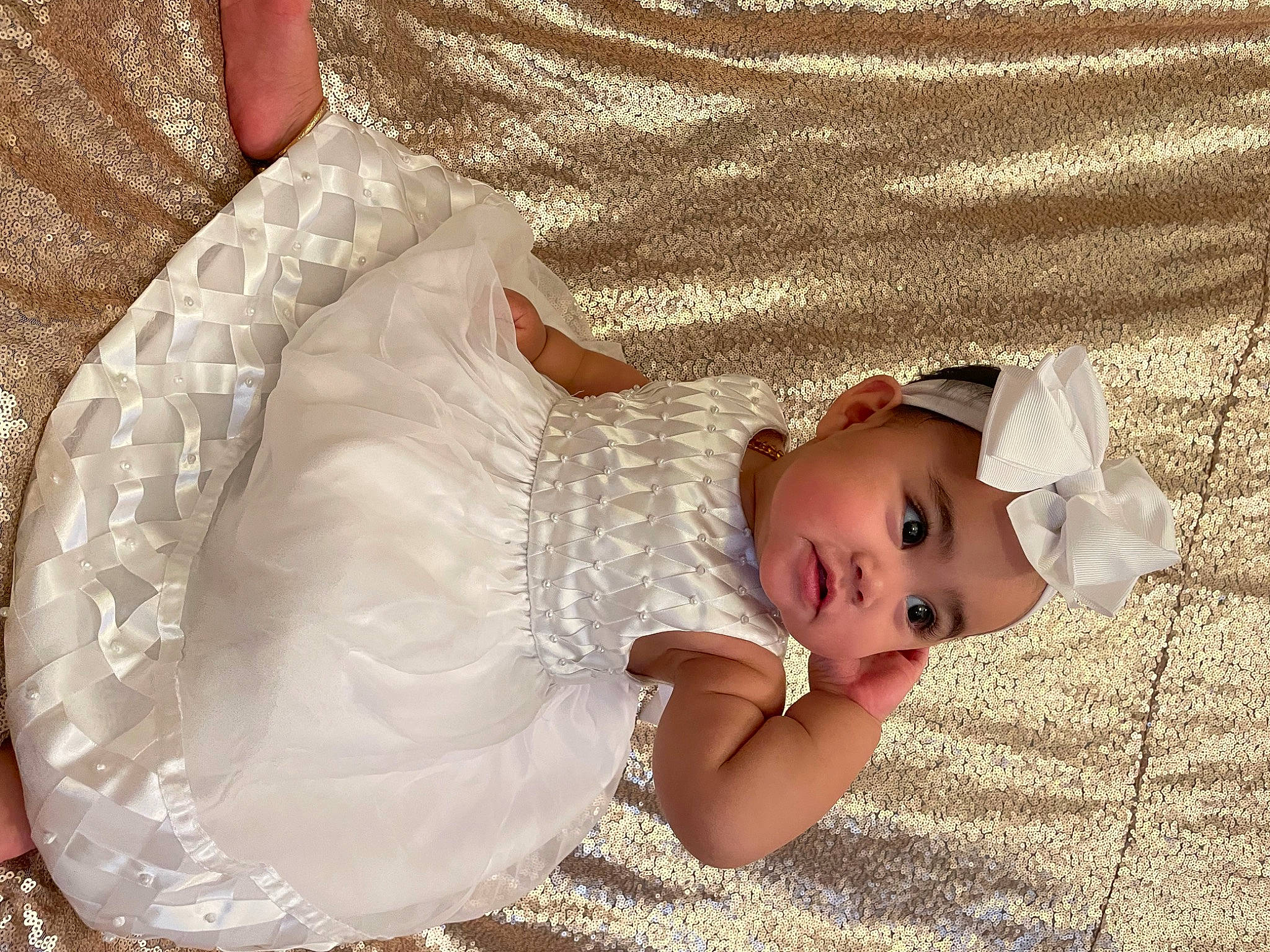 Kaelani joined the competition — help win amazing prizes! baby, baby_products, baby_sleeping, baby_toddler_clothing, child, comfort, dress, embellishment, hand, head, headgear, headwear, human_body, iris, linens, pattern, person, sitting, skin, sleeve