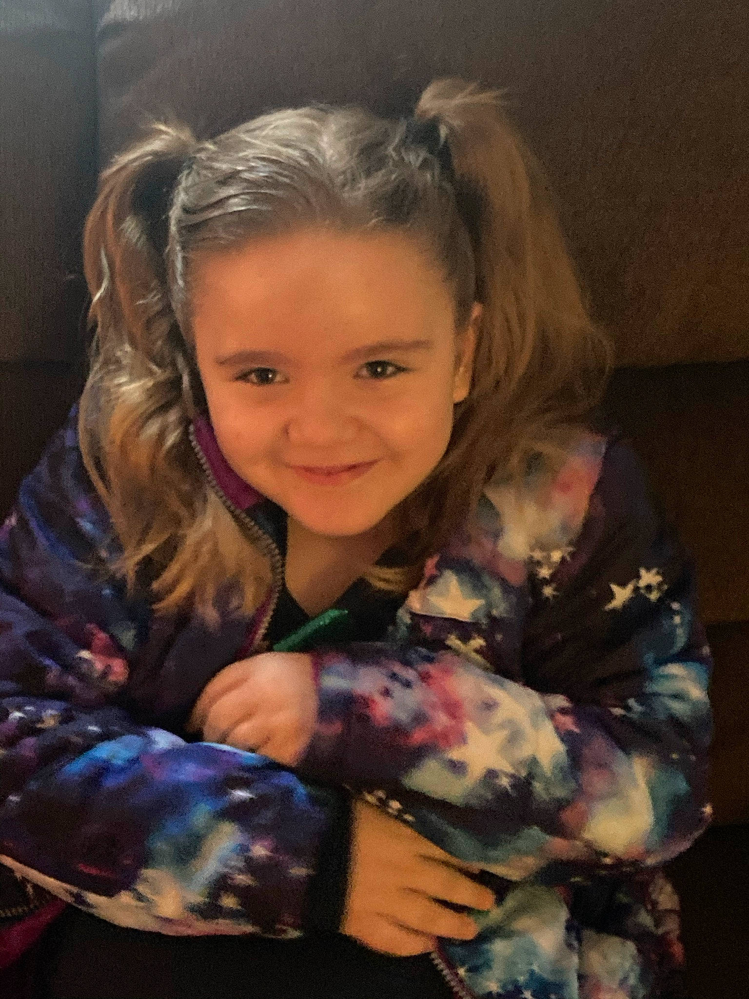 Hannah is registered to the contest to win money with this photo: arm, cheek, dress, eye, facial_expression, finger, flash_photography, gesture, hair, hand, happy, head, human_body, iris, joy, military_camouflage, mouth, person, plant, skin