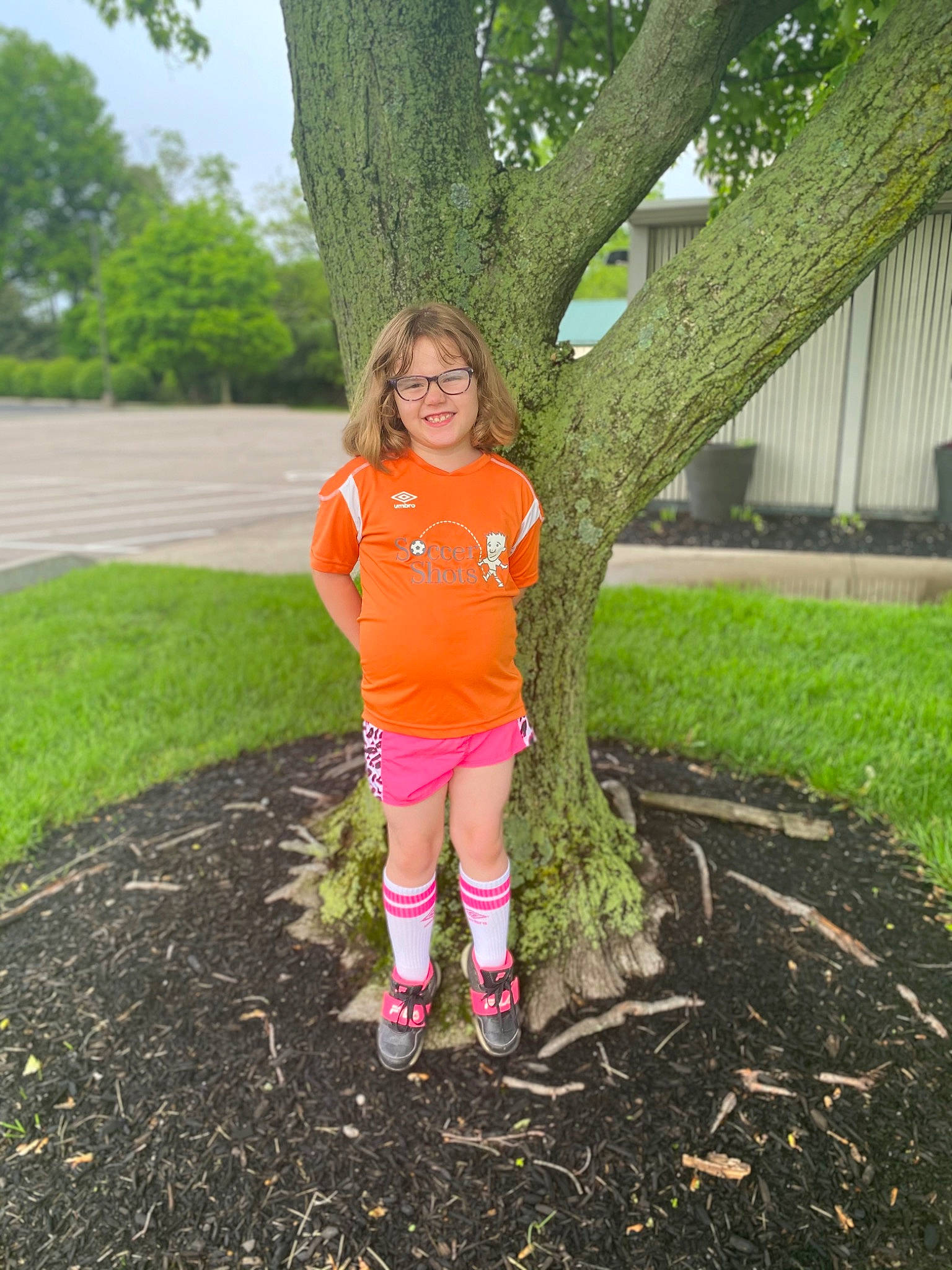 Hannah joined the competition — help win amazing prizes! footwear, garden, grass, happy, human_leg, joy, knee, leisure, morning, people_in_nature, person, plant, recreation, shoe, sky, smile, sneakers, soil, toddler, tree