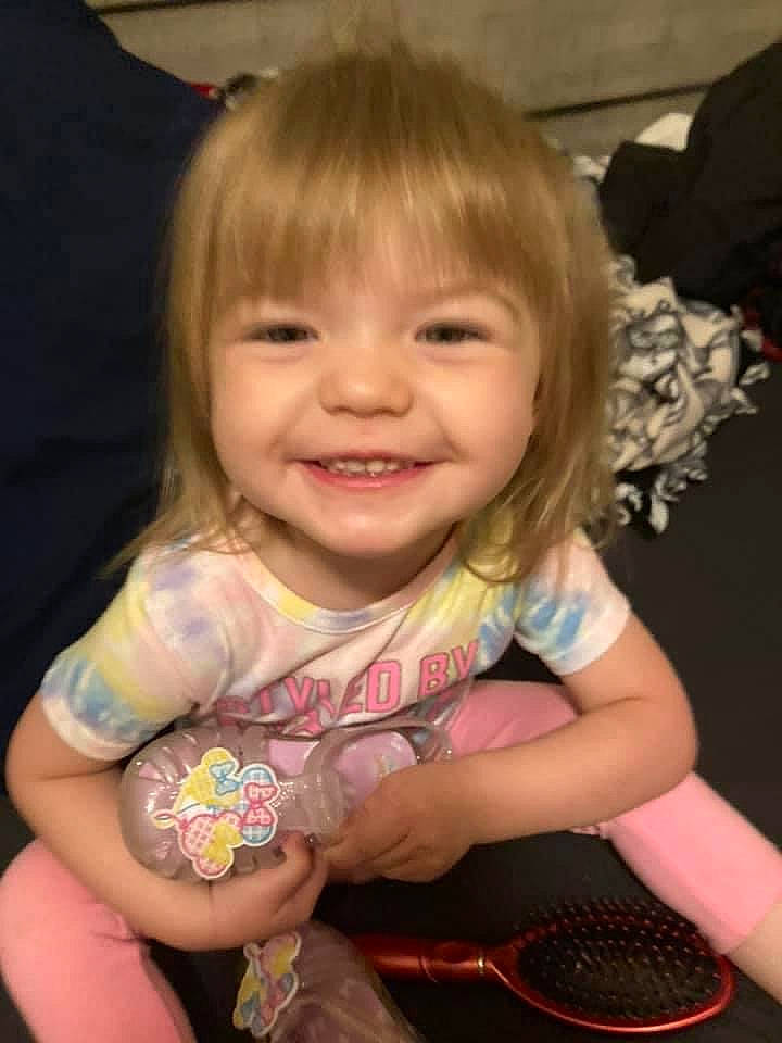 Lani is registered to the contest to win money with this photo: arm, baby, baby_toddler_clothing, blond, cheek, child, finger, hair, hand, happy, iris, joy, lip, mouth, nose, organ, person, pink, skin, smile