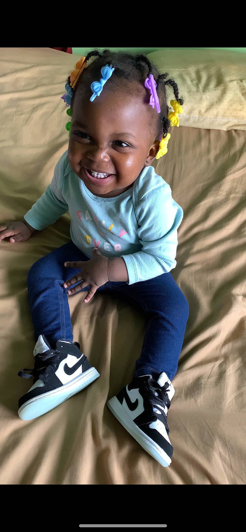 Aziya is registered to the contest to win money with this photo: child, cool, footwear, fun, happy, joy, person, play, recreation, shoe, smile, toddler