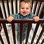 Jay Oliver joined the competition — help win amazing prizes! baby, crib, pajamas, smiling, standing, wooden_bars, bottle, blanket, mattress, nursery, infant, child, happy, face, hands, foot, indoor, clothing, cute, person