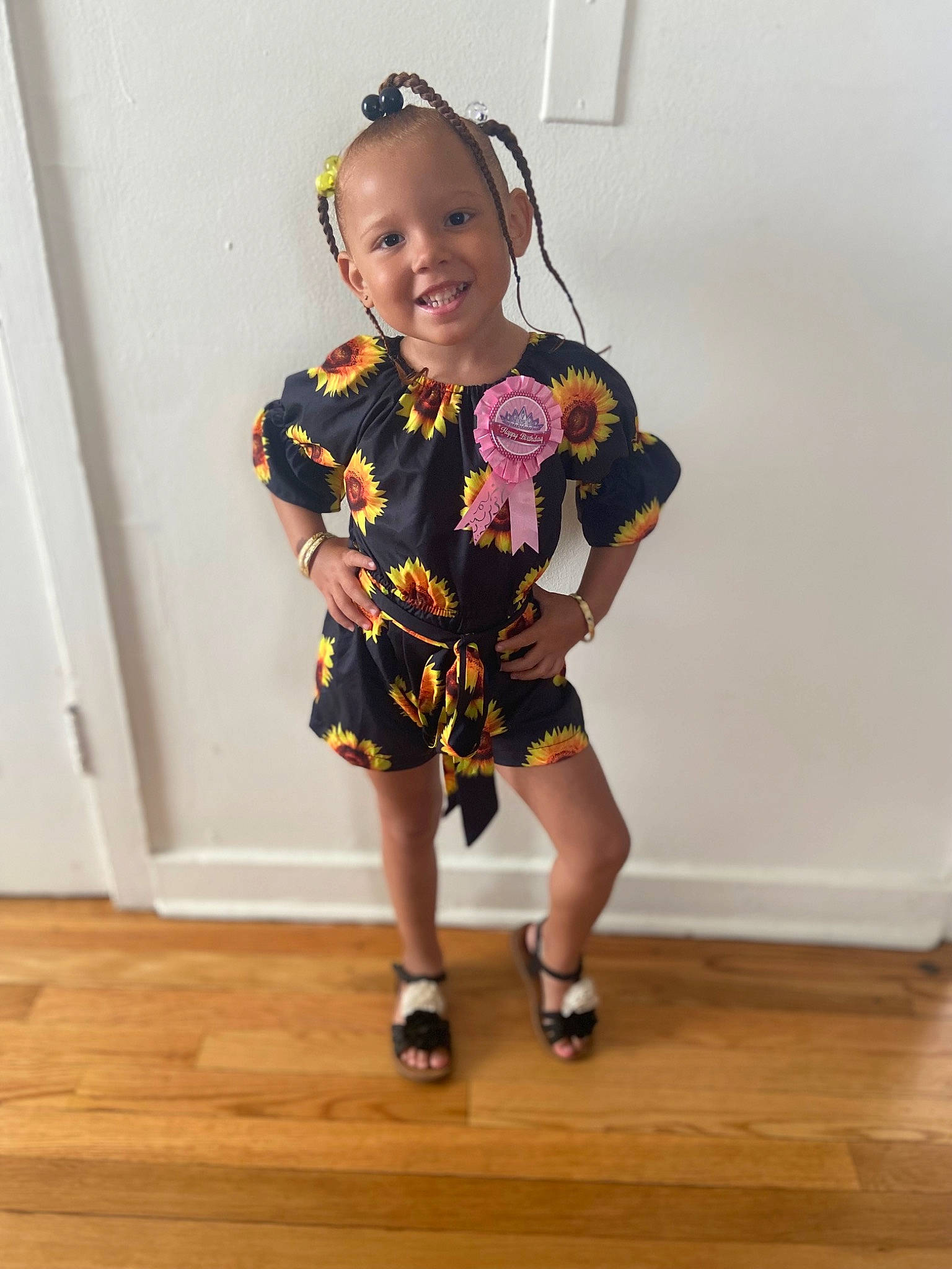 Jeylianise is registered to the contest to win money with this photo: baby_toddler_clothing, dress, event, fashion_design, floor, flooring, happy, hardwood, human_leg, joint, joy, knee, neck, pattern, person, sandal, shoe, sleeve, smile, thigh