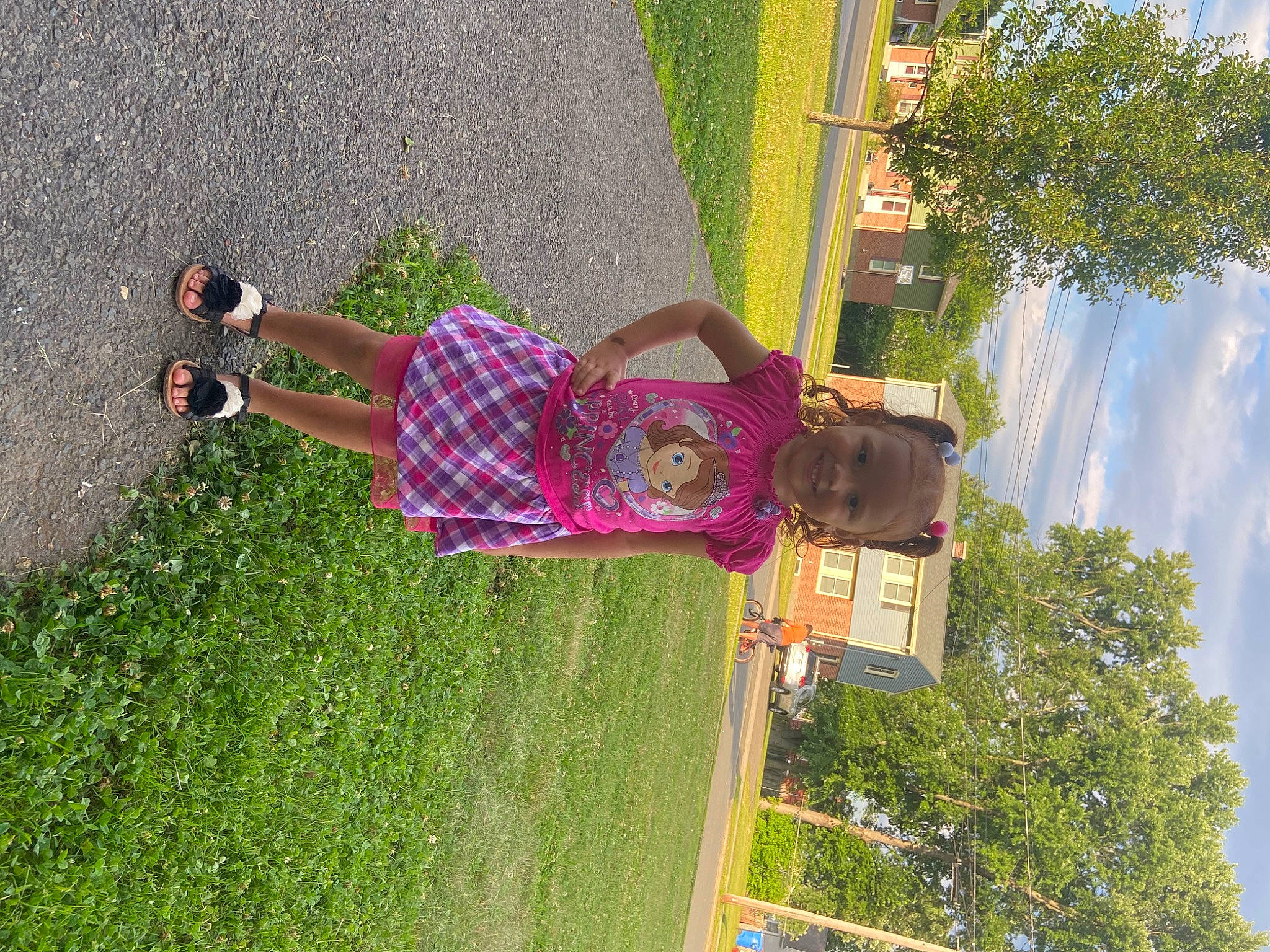 Jeylianise is registered to the contest to win money with this photo: flower, fun, grass, green, house, human_leg, joy, landscape, leisure, line, pattern, people_in_nature, person, plant, recreation, shadow, shrub, sky, smile, toddler