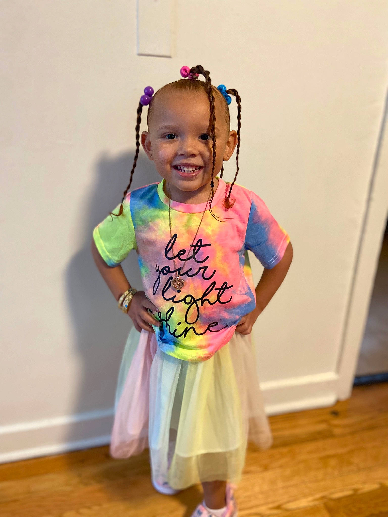 Jeylianise is registered to the contest to win money with this photo: baby_toddler_clothing, child, dress, event, fashion_accessory, flooring, fun, hair_accessory, hair_tie, happy, human_body, jewellery, joy, magenta, party_supply, person, personal_protective_equipment, shoulder, sleeve, smile