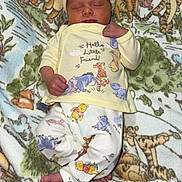 Lucy joined the competition — help win amazing prizes! baby, newborn, sleeping, pajamas, hat, blanket, winnie_the_pooh, tigger, eeyore, piglet, toddler, child, cute, infant, clothing, soft, cozy, laying_down, indoors, person