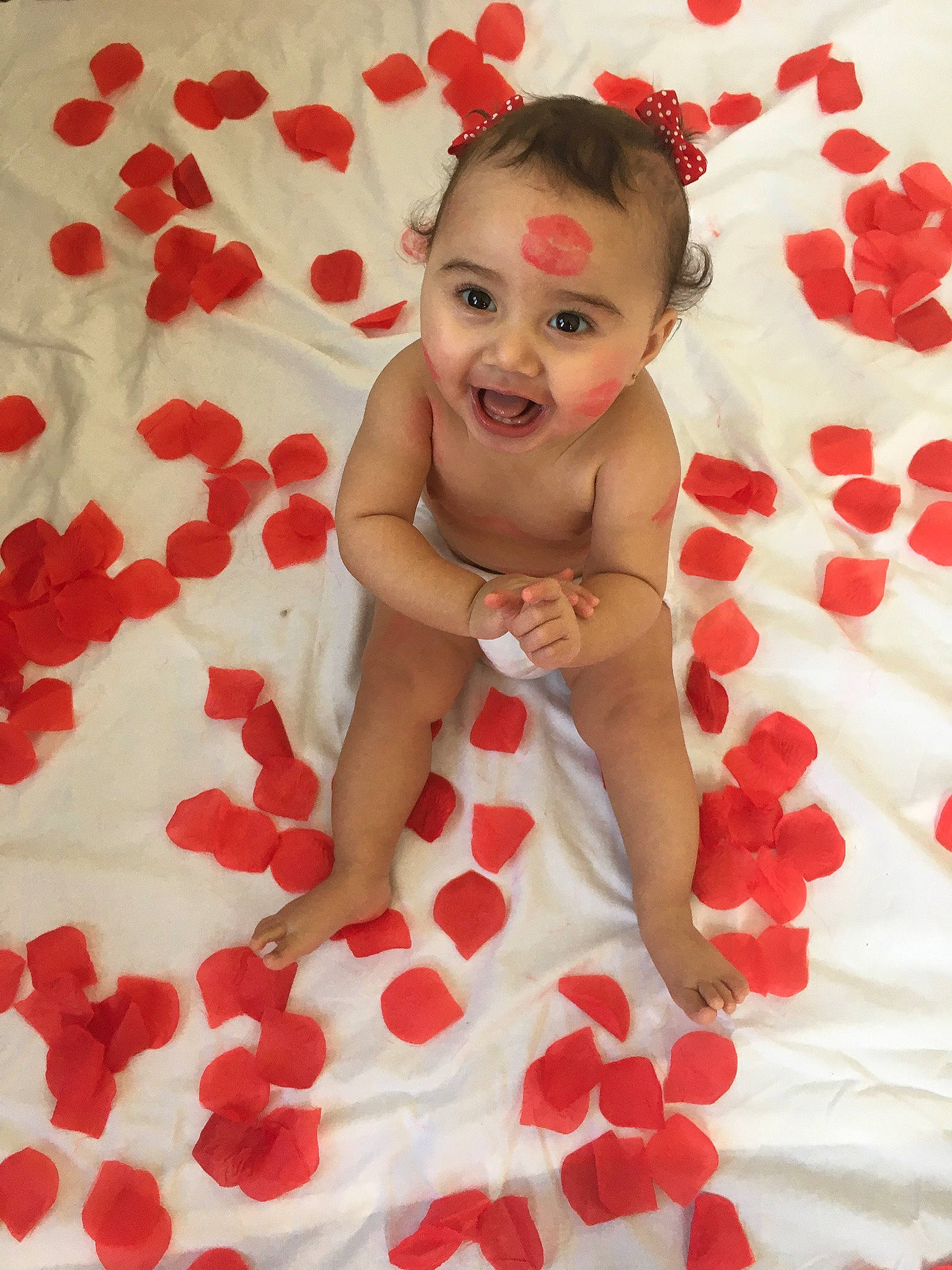 Aylin joined the competition — help win amazing prizes! baby, cheek, child, finger, pattern, person, petal, pink, plant, red, skin, textile, toddler