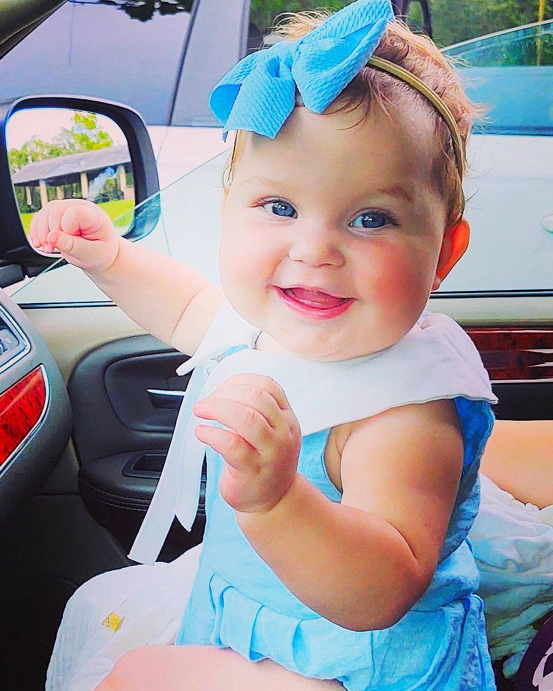 Brandilynn is registered to the contest to win money with this photo: auto_part, automotive_design, automotive_exterior, automotive_mirror, car, car_seat, cool, electric_blue, finger, gesture, happy, joy, leisure, motor_vehicle, person, pink, recreation, skin, smile, steering_wheel