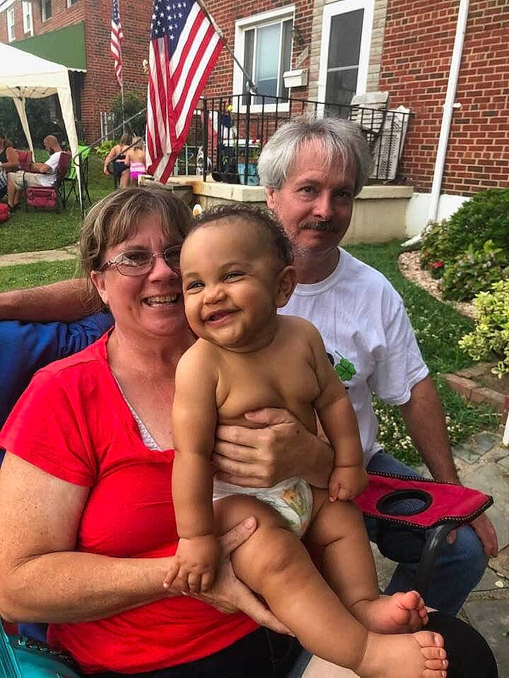 Wayne is registered to the contest to win money with this photo: child, daughter, family, fun, joy, lap, leisure, people, person, sitting, smile, summer, vacation