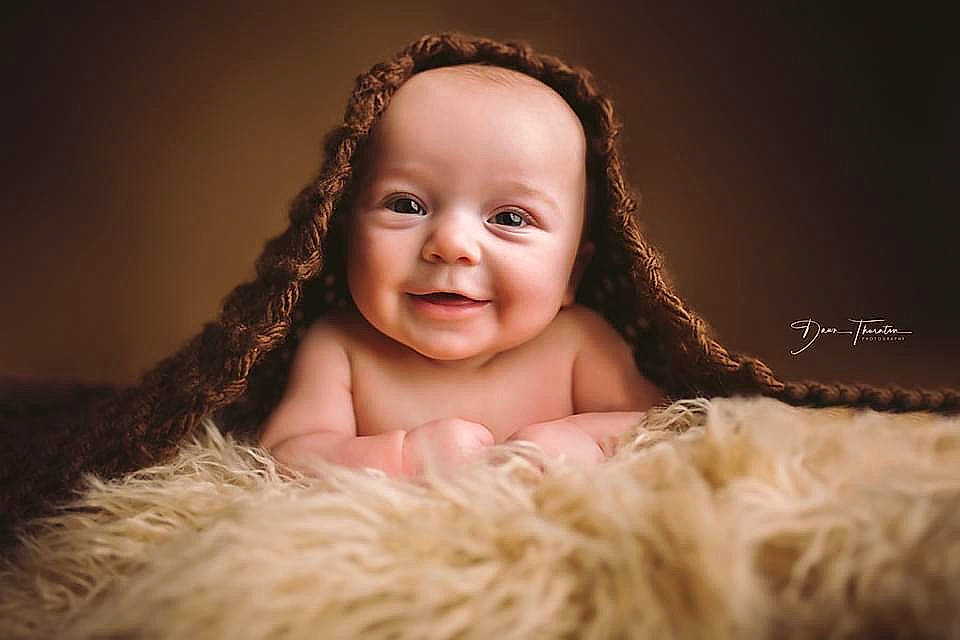 Huck is registered to the contest to win money with this photo: baby, cheek, chin, comfort, ear, eye, eyebrow, eyelash, face, flash_photography, fun, happy, head, headgear, headwear, iris, joy, lip, nose, person