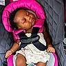 Jhené joined the competition — help win amazing prizes! baby, sleeping, car_seat, child, infant, safety_harness, pink, gray, curly_hair, dress, pacifier, relaxed, cute, seat, child_safety, resting, indoors, comfort, young, peaceful