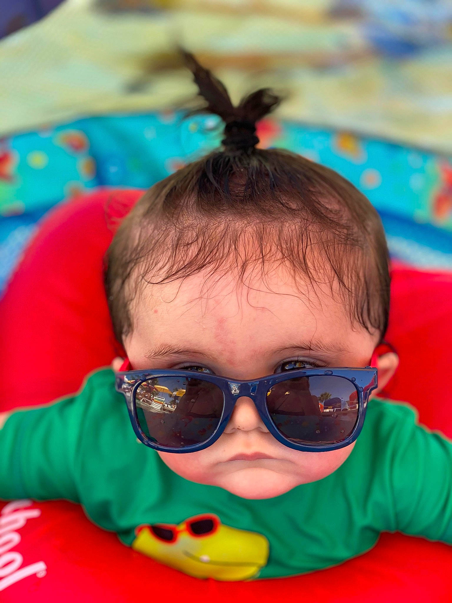 Keanu is registered to the contest to win money with this photo: baby, child, cool, ear, eyewear, face, fun, games, glasses, goggles, hair, hairstyle, head, leisure, person, personal_protective_equipment, recreation, smile, sunglasses, toddler