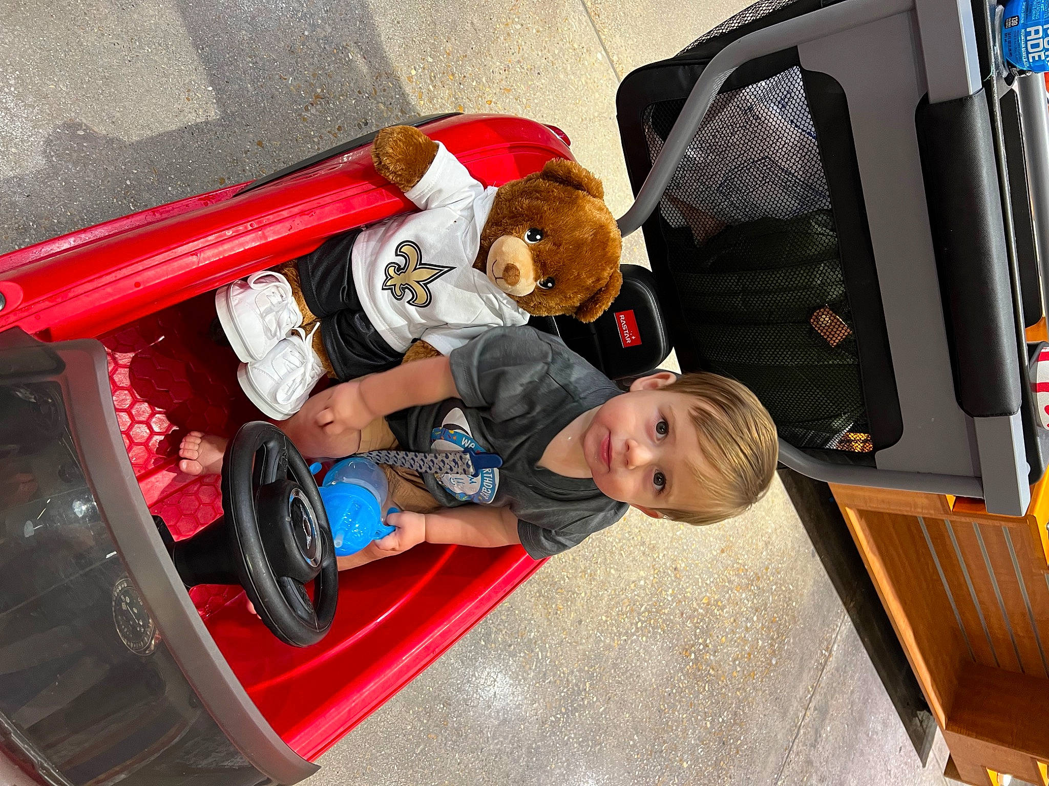 Everett is registered to the contest to win money with this photo: auto_part, automotive_design, automotive_exterior, automotive_lighting, automotive_tire, automotive_wheel_system, bumper, fender, fun, motor_vehicle, person, product, rim, rolling, shorts, synthetic_rubber, tire, tread, vehicle, vehicle_door