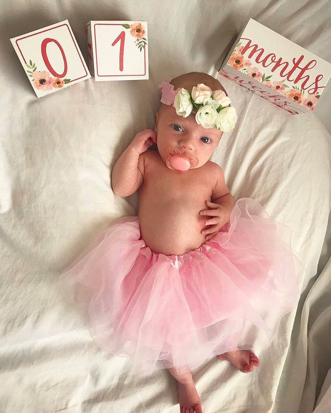 Nina is registered to the contest to win money with this photo: baby, baby_toddler_clothing, ballet_tutu, child, costume, costume_accessory, dress, hair_accessory, headpiece, person, pink, product, toddler